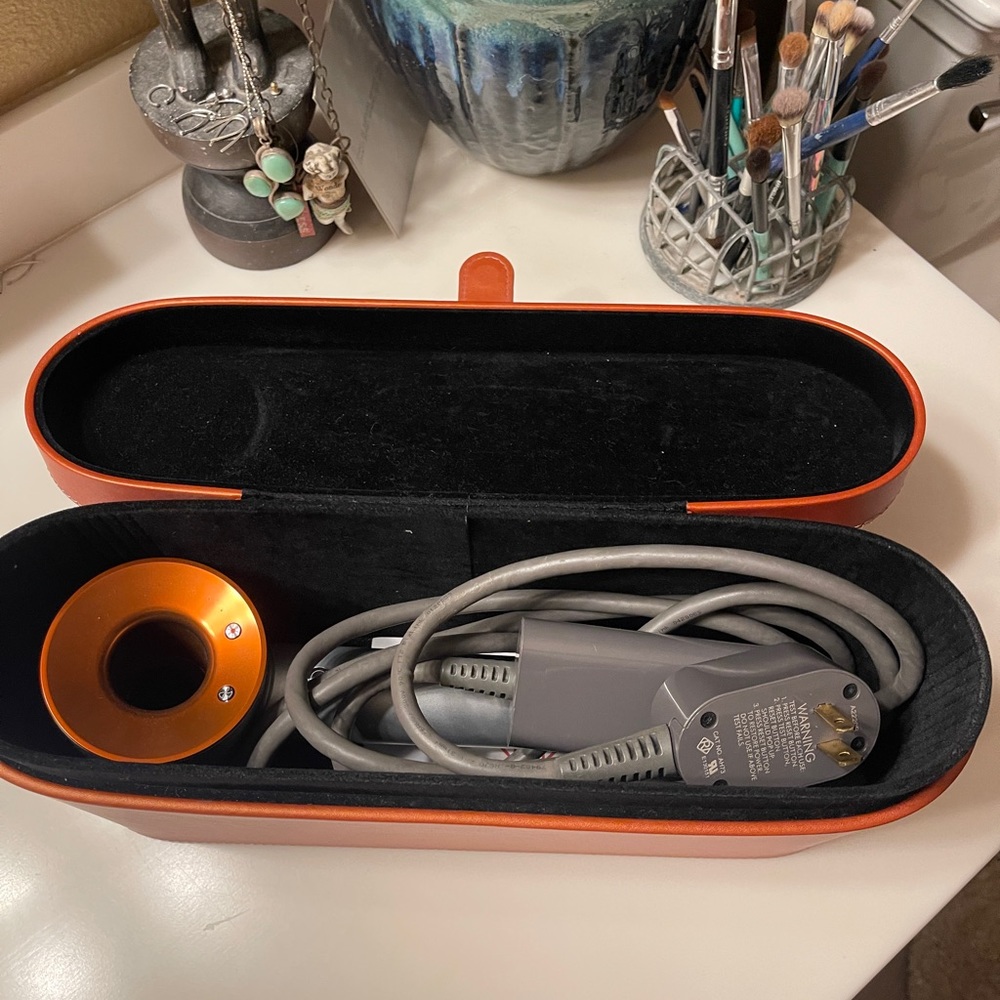 Used. Great condition Dyson Copper Blow Dryer. Free shipping